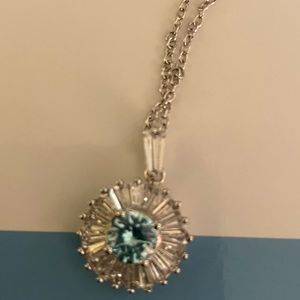 Sliver tones necklace and earrings with blue center stone. Custom jewelry